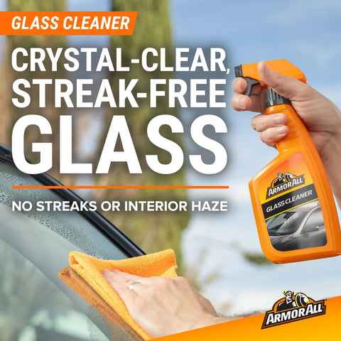 All in One Eight Piece Car Care Kit With Extreme Tire Shine And Ultra Shine Wash And Wax Glass Cleaner bottle in hand