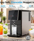 Slick Countertop Nugget Ice Maker With Self Dispensing Tray Drops Thirty Three Pounds Of Fresh Chewy Ice Daily Ready In Ten Minutes pouring ice into a glass.