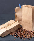 100 Pack Brown Kraft Paper Lunch Bags With 4lb Capacity, 5 By 2.95 By 9.45 Inches Fold Top Disposable Bags with coffee beans