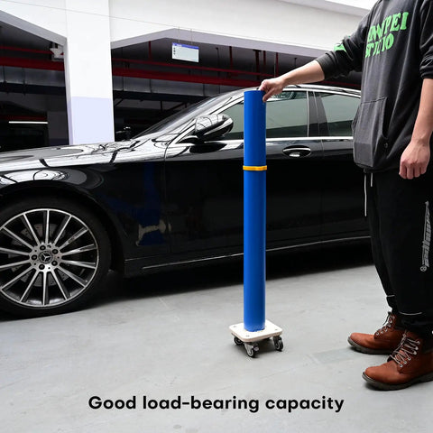 Portable Vinyl Roll Rack Stand With Lockable Caster Wheels For Mobile Car Wrap Material Rolls Media Decals Film Transfer Paper And Tape Holder Sign Shop Organization In A Heavy Duty Wood Frame With Plastic Core in use next to a car