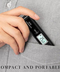 Person placing Grab And Go Pocket Sized Infrared Thermometer With Contactless Reading Handheld Temperature Pen in shirt pocket