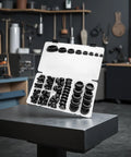 125 Piece Black Silicone Plots For Round Holes 8 Sizes Assorted Snap Locking Rubber Grommets With Storage Case, arranged in case