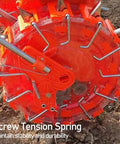 Close-up of Double Row Garden Seeder Planter Hand Push Spreader with screw tension spring and stainless steel nozzles.