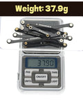Beefed Up Heavy Duty Stainless Steel High Clearance Link Set For TRX4M Defender And Bronco Black Coated Drop In Replacement For Stock Plastic Links Precision Machined For Stable Performance 42g Per Set, 37.9g shown