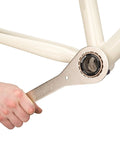 BBT-29 Double-Ended Bottom Bracket Tool for 16-notch cups 39mm and 48.5mm in use on bike frame for maintenance