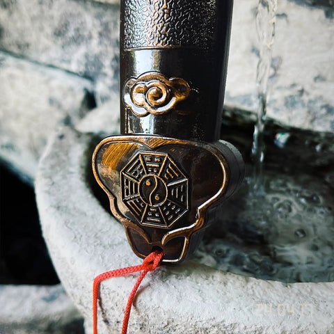 Close-up of the hilt on 36 Inch Tai Chi Training Sword With Retractable Design For Indoor And Outdoor Practice Dope Swordplay Training Accessory