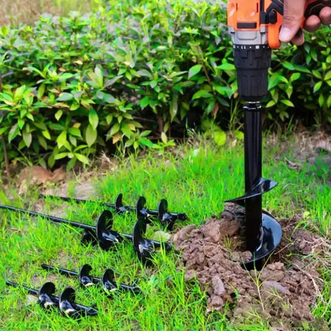 Rapid Planting Auger Drill Bit For Gardens Two By Eight Point Seven Inch Size with drill in grassy area creating hole
