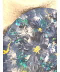 Close-up of 16 Inch Floral Resin Lazy Susan on Wood Serving Tray Base Blue Gold White Art Organizer for Kitchen Countertop And Dining Table Elevates Your Home Decor And Keeps Skincare Bath Products And Small Accessories Sorted And Styled