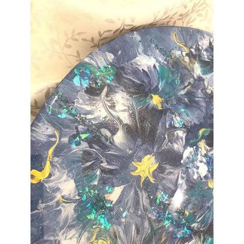 Close-up of 16 Inch Floral Resin Lazy Susan on Wood Serving Tray Base Blue Gold White Art Organizer for Kitchen Countertop And Dining Table Elevates Your Home Decor And Keeps Skincare Bath Products And Small Accessories Sorted And Styled