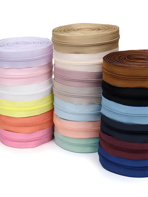 Rolls of colored nylon zippers including sky blue. Complete 4.5 Meter Nylon Zipper Repair Kit With 10 Matching Plastic Pulls For Size 3 Zip Tape In Sky Blue Perfect For Apparel Textile Luggage DIY Sewing And Craft Projects.