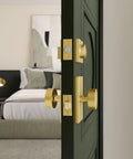 Top Shelf Smart Deadbolt With Bluetooth And WiFi Electronic Lock Featuring Solid Brass Build And Lifetime Satin Nickel Finish, close-up view on green door.
