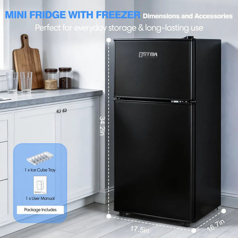 Straight Up Game Changer 3.2 Cubic Foot Mini Fridge With Separate Freezer in matte black finish beside kitchen countertop.