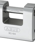 Beefy Monoblock Brass Padlock 92 65 Keyed Different, key retaining, solid brass body with steel jacket, close-up angle.