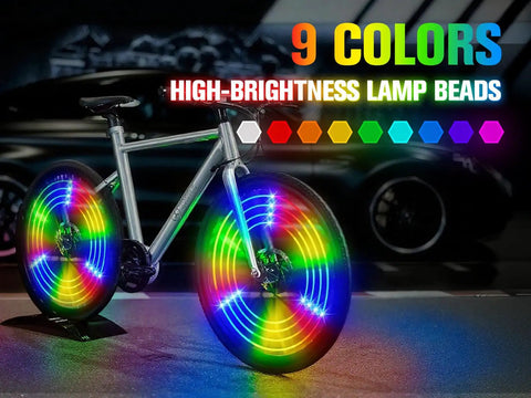 Silver bike with vibrant three-pronged LED wheels, showing the Three Pronged Bicycle Spoke Lights Set for Bike Wheels With 360 Degree Visibility LED Wheel Lights Vibration Sensing Three Color Strip on Each Wheel Two Piece Glow Kit for Night Rides in action.