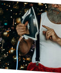 Heavy Duty PTFE Steam Hose For Steam Irons in use, showing lightweight, flexible design during ironing near a decorated Christmas tree.
