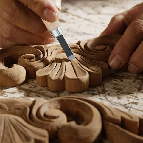 Detail of Pro Grade Ten Piece Wood Carving Chisel Set Forged From Heat Treated Chrome Vanadium Steel carving intricate design in wood.