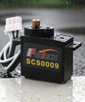 Close-up of Pro Grade High Torque Micro Servo Kit 2.3Kg Metal Gear 300 Degree Encoder TTL RS485 Serial Bus, SCS009 model with connectors