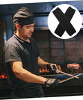 2 Pairs Cut Resistant Arm Sleeves Heavy Slash Proof Arm Guards For Welding Gardening And Mechanic Jobs Built Tough With Breathable PE Mesh So Your Forearms Stay Locked Safe Without The Drama All Day worn by a chef grilling.