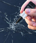 No Fuss Windshield Crack Repair Kit for Chips and Small Cracks, Auto Glass Repair Fluid being applied to cracked windshield