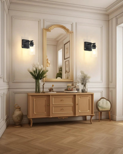 Cordless Battery Wall Sconces Set Of Two With Remote Control Black USB C Rechargeable indoor lighting on wall next to mirror.