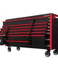 Massive Seventy Two Inch Rolling Tool Chest With Seventeen Deep Drawers Magnetic Locking Wheels Professional Grade Garage Workstation In Tough Black Build Featuring Classic Red Pulls side view