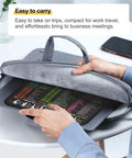 Person inserting Portable Mouse Pad With Excel Word PowerPoint Windows Shortcuts Cheat Sheet for Office and Gaming, 11.8 by 9.8 Inch into a grey laptop case.