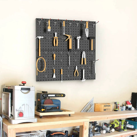 Heavy Duty Metal Pegboard Wall Organizer for Garage and Workshop 24 By 24 Inch Or 12 By 48 Inch Panels 70 Piece Tool Storage Pegboard Set With Hooks for Workbench Black installed on wall with tools