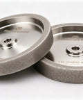 Sharpen Old Blades With This Badass CBN Grinding Wheel Built For Razor Precision Six Inch Face Width Half Inch Arbor Fits HSS Bits Lathe Chisels Woodturners And Standard Bench Grinders While Delivering Butter Smooth Cuts Zero Vibration Guaranteed. Two 6-inch CBN grinding wheels with 1/2-inch arbor for precision sharpening.