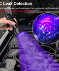 Front view: Vansky 68-LED AC leak detector UV flashlight, handheld black automotive tool with purple glow.