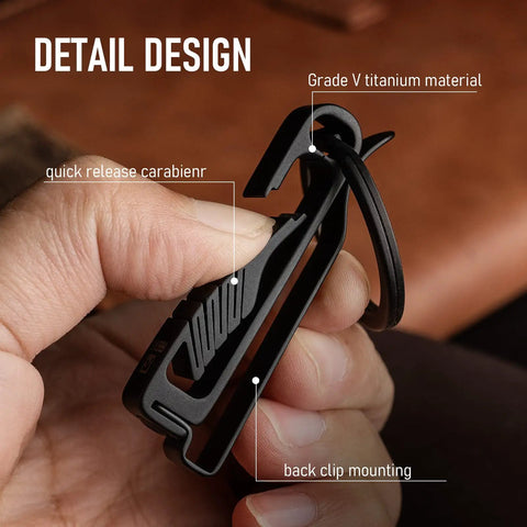 Titanium Belt Clip Key Holder with Carabiner and D Ring in hand, showcasing detail design, ultra durable keychain clip for men.