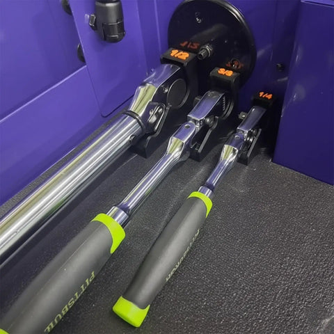 Magnetic Ratchet Holder Set For Toolbox with 3 modular holders for 1/4, 3/8, 1/2 inch wrenches and sockets on a purple surface