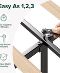 Straight Up Comfy Premium Upholstered Queen Bed Frame Featuring A Bold Asymmetric Headboard And Iron Clad Steel Base For A Seamless Setup Construction assembly process with a hand holding a ratchet wrench.