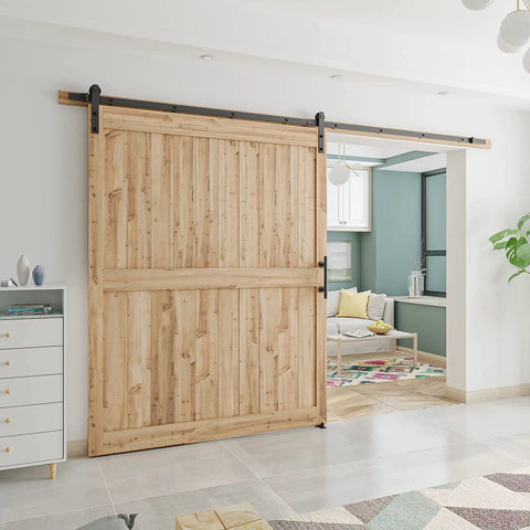 All In One Heavy Duty Sliding Barn Door Hardware Kit Features 11 Foot Track With Whisper Quiet Nylon Rollers For Rock Solid Reliability Smooth Silent Operation Dead Simple Install Durable Alloy Frame No Door Included Matte Black Finish, showcasing a wooden barn door.
