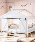 Kid Approved Full Size Floor Bed Frame With Sliding Barn Door And Built In Soft Glow Light in a cozy child's room setup.