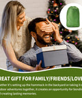 Couple with gift box and Ultra Durable Camping Hammock With Mesh Net For Outdoor Adventures Portable Hanging Bed image