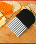 Stainless steel crinkle cutter with black handle; ridged blade for French fries, 13.5 cm long