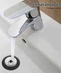 Rubber Bathtub Drain Stopper Plug with Stainless Steel Seal shown in use, positioned under a running faucet in a bathtub.