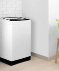 White top-load portable washing machine with black base; 3.0 cu ft capacity in laundry room.