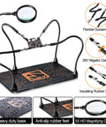 Front view of M-T Helping Hands soldering station with four gooseneck arms and magnifier on a 13x9 in anti-slip steel base