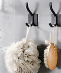 Top Notch Wall Mounted Coat Rack Easy Peasy Drill Free Install Hella Sturdy Stainless Steel Hook Rail For Entryway Bedroom Holds jackets, loofah, and brush.
