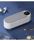 This Slick Little Ultrasonic Cleaner Machine Packs A Serious Punch With A Roomy 300 ML Tank for cleaning rings and glasses.
