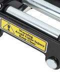Beefed Up Heavy Duty Electric Winch Roller Fairlead 2000 Lb Load Capacity Cable Guide For Truck Off Road And Trailer Recovery Steel Construction Rugged Winch Accessory close-up with warning label