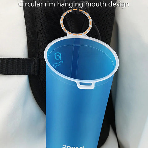 Foldable Water Bottle 200ml Shatterproof, Lightweight Hydration Bottle hanging on a backpack, blue with wide mouth design