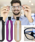 Three eyeglasses cleaner pens in black, purple, and rose gold with microfiber brush tips.