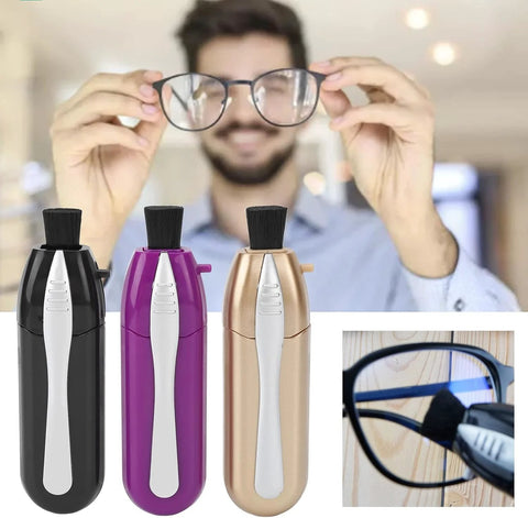 Three eyeglasses cleaner pens in black, purple, and rose gold with microfiber brush tips.