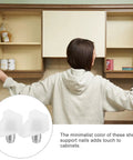Scene with person adjusting a kitchen cabinet using 100 Pack White Plastic And Stainless Steel Shelf Pegs for sturdy support.