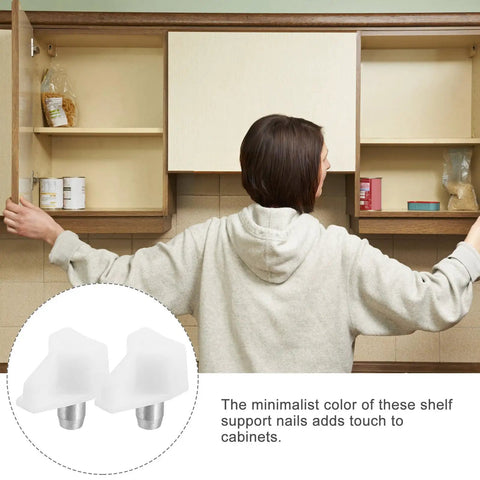 Scene with person adjusting a kitchen cabinet using 100 Pack White Plastic And Stainless Steel Shelf Pegs for sturdy support.