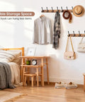 Bedroom with Acacia Wood Wall Coat Rack with Heavy Duty 4 Double Hooks, 15 Inch Long, holding coats, bags, and hats