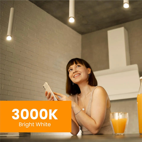 Woman under Enhance LED MR16 Reflector Bulb 50W Equivalent with GU5.3 Base 3000K Bright White, creating a warm ambiance.