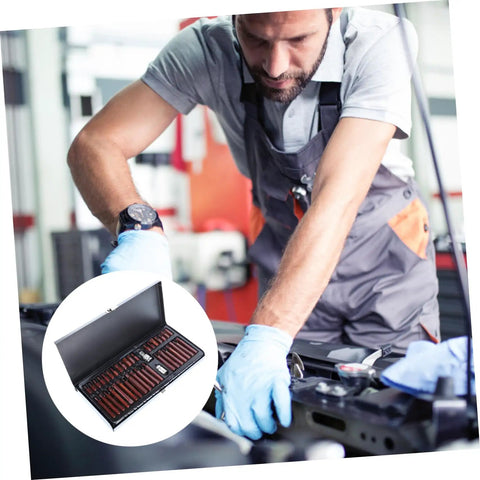 Pro Shop Grade Spline Socket Bit Set, Beefy Auto Repair Kit For Mechanics, Tough As Nails Multi Size Drive Sockets For Cars Trucks And Equipment, Sturdy Carry Case Included shown with a mechanic working on a car.